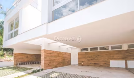 Casa em condomínio fechado com 3 quartos à venda na Rua José Pedro de Moura, 94, Jardim Isabel, Porto Alegre por R$ 995.000