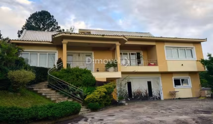 Casa com 4 quartos à venda na Rua Morro Alto, 155, Campo Novo, Porto Alegre por R$ 850.000