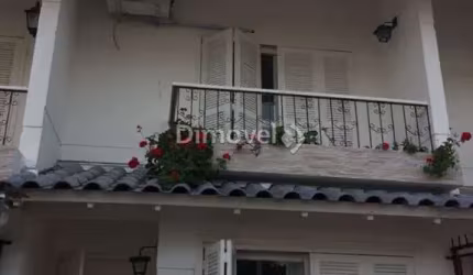 Casa com 2 quartos à venda na Rua Irmão Jaime Biazus, 43, Guarujá, Porto Alegre por R$ 599.000