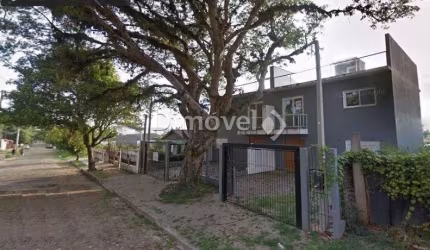 Casa com 3 quartos à venda na Rua Jacundá, 87, Guarujá, Porto Alegre por R$ 500.000