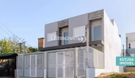 Casa com 3 quartos à venda na Rua Doutor Cláudio Walter Ferreira da Silva, 251, Guarujá, Porto Alegre por R$ 430.000