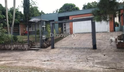 Casa com 4 quartos à venda na Rua Potiguara, 181, Vila Assunção, Porto Alegre por R$ 2.200.000