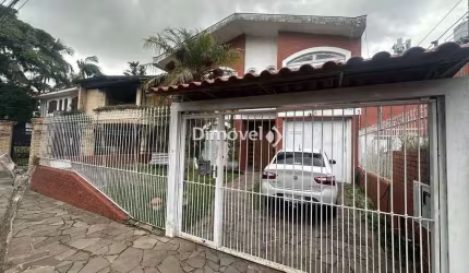 Casa com 4 quartos à venda na Rua Vicente Failace, 466, Tristeza, Porto Alegre por R$ 890.000