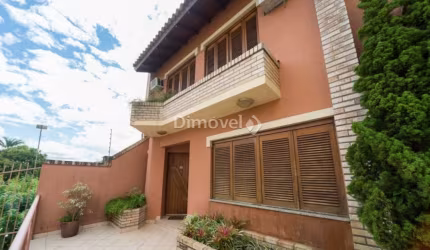 Casa em condomínio fechado com 3 quartos à venda na Rua Padre João Batista Reus, 1040, Tristeza, Porto Alegre por R$ 1.080.000