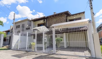 Casa com 4 quartos à venda na Rua Adão Pinheiro da Silva, 420, Ipanema, Porto Alegre por R$ 1.190.000
