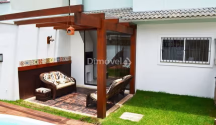 Casa em condomínio fechado com 3 quartos à venda na Rua Corticeira, 754, Hípica, Porto Alegre por R$ 730.000