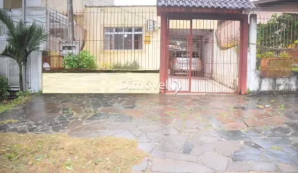 Casa com 4 quartos à venda na Rua Cachoeira, 396, Nonoai, Porto Alegre por R$ 370.000