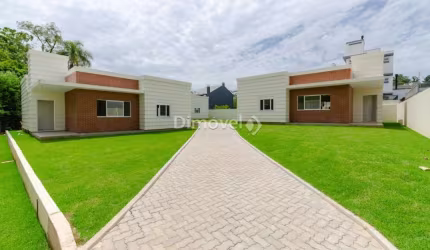 Casa em condomínio fechado com 3 quartos à venda na Rua Canísio Binsfeld, 226, Hípica, Porto Alegre por R$ 595.000