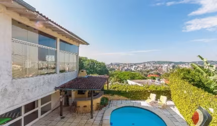 Casa com 5 quartos à venda na Rua Coroados, 526, Vila Assunção, Porto Alegre por R$ 1.280.000