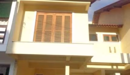 Casa em condomínio fechado com 3 quartos à venda na Rua Pau Brasil, 774, Hípica, Porto Alegre por R$ 425.000
