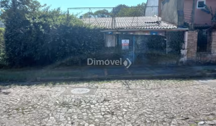 Terreno à venda na Rua dos Guenoas, 821, Guarujá, Porto Alegre por R$ 400.000