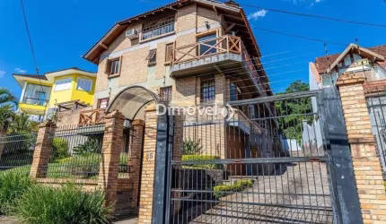 Casa em condomínio fechado com 3 quartos à venda na Rua Doutor Arnaldo da Silva Ferreira, 35, Jardim Isabel, Porto Alegre por R$ 900.000