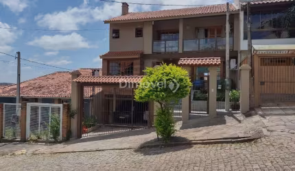 Casa com 3 quartos à venda na Rua Inês Vinhas, 45, Espírito Santo, Porto Alegre por R$ 1.090.000