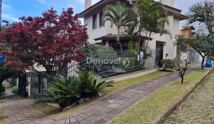 Casa com 3 quartos à venda na Rua Edgar Luiz Schneider, 165, Jardim Isabel, Porto Alegre por R$ 750.000