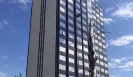 SALA NO EDIFÍCIO DIPLOMAT   Metragem 68,90 m², Banheiro, Piso de granito e planejados.