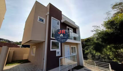Sobrado novo em condomínio, 3 quartos sendo uma suíte e 2 vagas