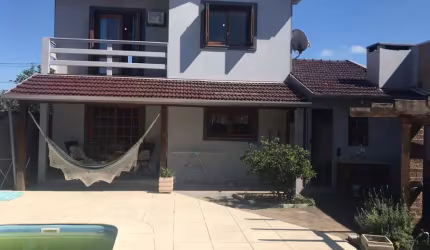 Casa com 3 quartos à venda na Rua Walter Hennemann, 286, Scharlau, São Leopoldo por R$ 690.000