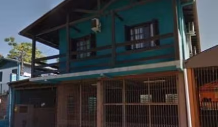 Casa com 3 quartos à venda na Rua Vinte e Cinco de Julho, 1191, Vargas, Sapucaia do Sul por R$ 450.000