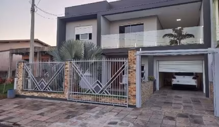 Casa com 3 quartos à venda na Rua Orlindo Nedel, 64, Nova Sapucaia, Sapucaia do Sul por R$ 530.000