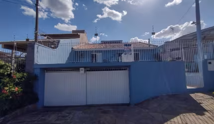 Casa com 3 quartos à venda na Rua Rui Ramos, 179, Silva, Sapucaia do Sul por R$ 390.000