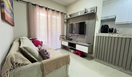 APARTAMENTO PRAIA GRANDE com 2 dormitórios sendo 1 suíte,1 vaga de garagem,varanda gourmet com churrasqueira,sala 2 ambientes