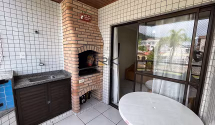 APARTAMENTO PRAIA GRANDE com 2 dormitórios sendo 1 suíte,1 vaga de garagem,varanda gourmet com churrasqueira