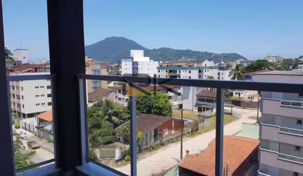 Apartamento no bairro do itaguá 2 dormitórios sendo 1 suíte, varanda gourmet, 1 vaga garagem e armário náutico, piscina e elevador