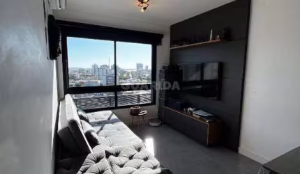 Apartamento totalmente mobiliado com 1 dormitório e 1 vaga no bairro Menino Deus