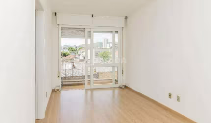 Apartamento com 1 dormitório e 1 vaga de garagem, no bairro Partenon