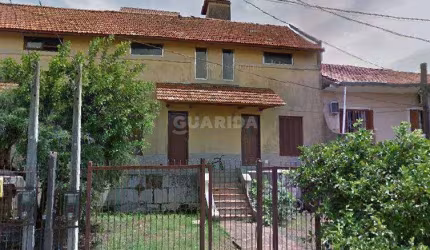 Casa Residencial/Sobrado com 1 dormitório, e 1 vaga de garagem no bairro Vila Nova