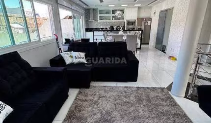 Casa Residencial com 3 dormitórios, sendo 1 suíte, e 5 vagas de garagem no bairro Jardim Leopoldina