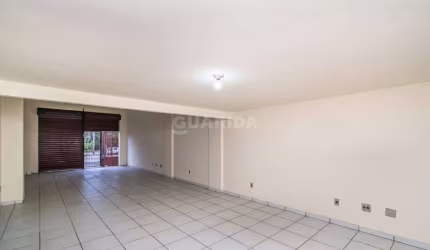 Loja comercial com mezanino e 100m² no bairro Partenon