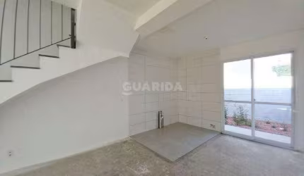 Sobrado novo, nunca habitado, de 2 dormitórios e 1 vaga de garagem no bairro Vila Nova!