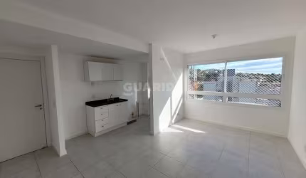 Apartamento com 2 dormitórios, sendo 1 suíte, para alugar no bairro Central Park