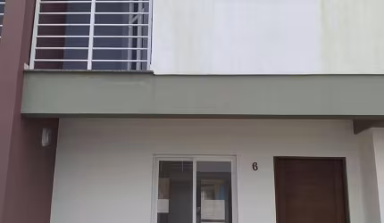 Casa em condomínio fechado com 2 quartos à venda na Rua Adão Eni Boeira Duarte, 1503, Flórida, Guaíba por R$ 215.000