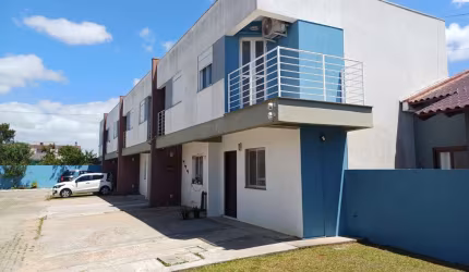 Casa em condomínio fechado com 2 quartos à venda na Rua Adão Eni Boeira Duarte, 1503, Flórida, Guaíba por R$ 200.000