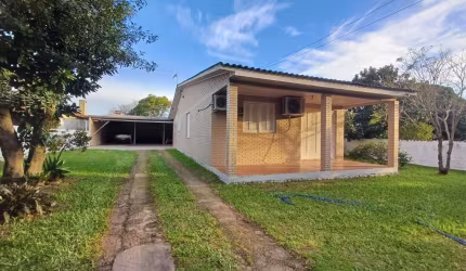 Casa com 2 quartos à venda na Doutor Fernando Mendes Ribeiro, 386, Flórida, Guaíba por R$ 730.000