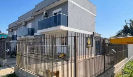 Casa com 2 quartos à venda na Rua Simões Lopes Neto, 326, Jardim dos Lagos, Guaíba por R$ 400.000