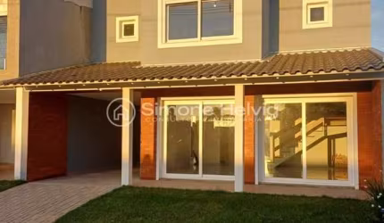 Casa em condomínio fechado com 3 quartos à venda na Avenida Frederico Warstat, 695, Sans Souci, Eldorado do Sul por R$ 1.100.000