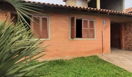 Casa com 3 quartos à venda na Avenida Dona Frutuosa, 1171, Coronel Nassuca, Guaíba por R$ 450.000