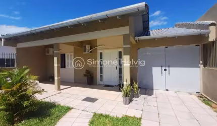 Casa com 3 quartos à venda na Avenida Ponche Verde, 175, Jardim dos Lagos, Guaíba por R$ 600.000