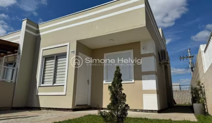 Casa em condomínio fechado com 2 quartos à venda na Rua Farroupilha, 1598, Centro Novo, Eldorado do Sul por R$ 295.000