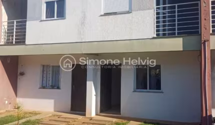 Casa em condomínio fechado com 2 quartos à venda na Rua Adão Eni Boeira Duarte, 1473, Flórida, Guaíba por R$ 240.000