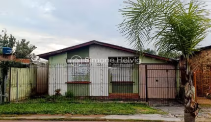 Casa com 3 quartos à venda na Antenos Caldas, 185, Morada da Colina, Guaíba por R$ 489.000