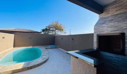 Sobrado contendo 3 dormitórios - espaço gourmet com churrasqueira e piscina.