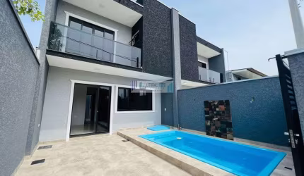 Sobrado contendo 3 dormitórios - espaço gourmet com churrasqueira e piscina.