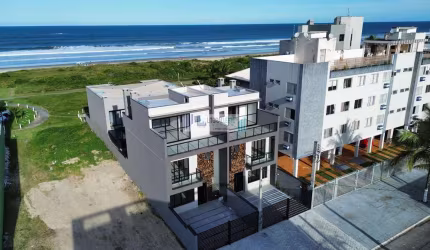Triplex contendo 3 dormitórios - suíte - terraço gourmet com vista para o mar.