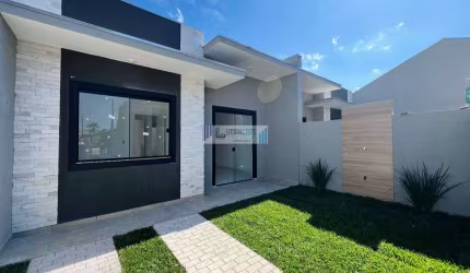 Residência em alvenaria - teto em laje - 2 dormitórios/suíte - churrasqueira.