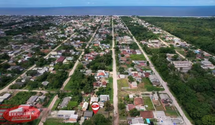 Terreno com casa de Madeira