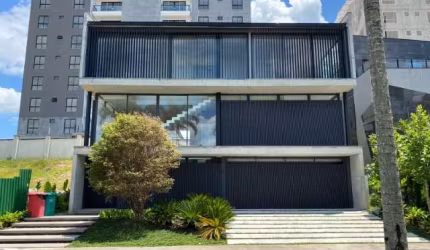 CASA TRIPLEX CONDOMINIO FECHADO  RIVIERA- NA PRAIA BRAVA - ITAJAÍ SEMI-MOBILIADA ALTO PADRÃO 04 SUÍTES VISTA MAR